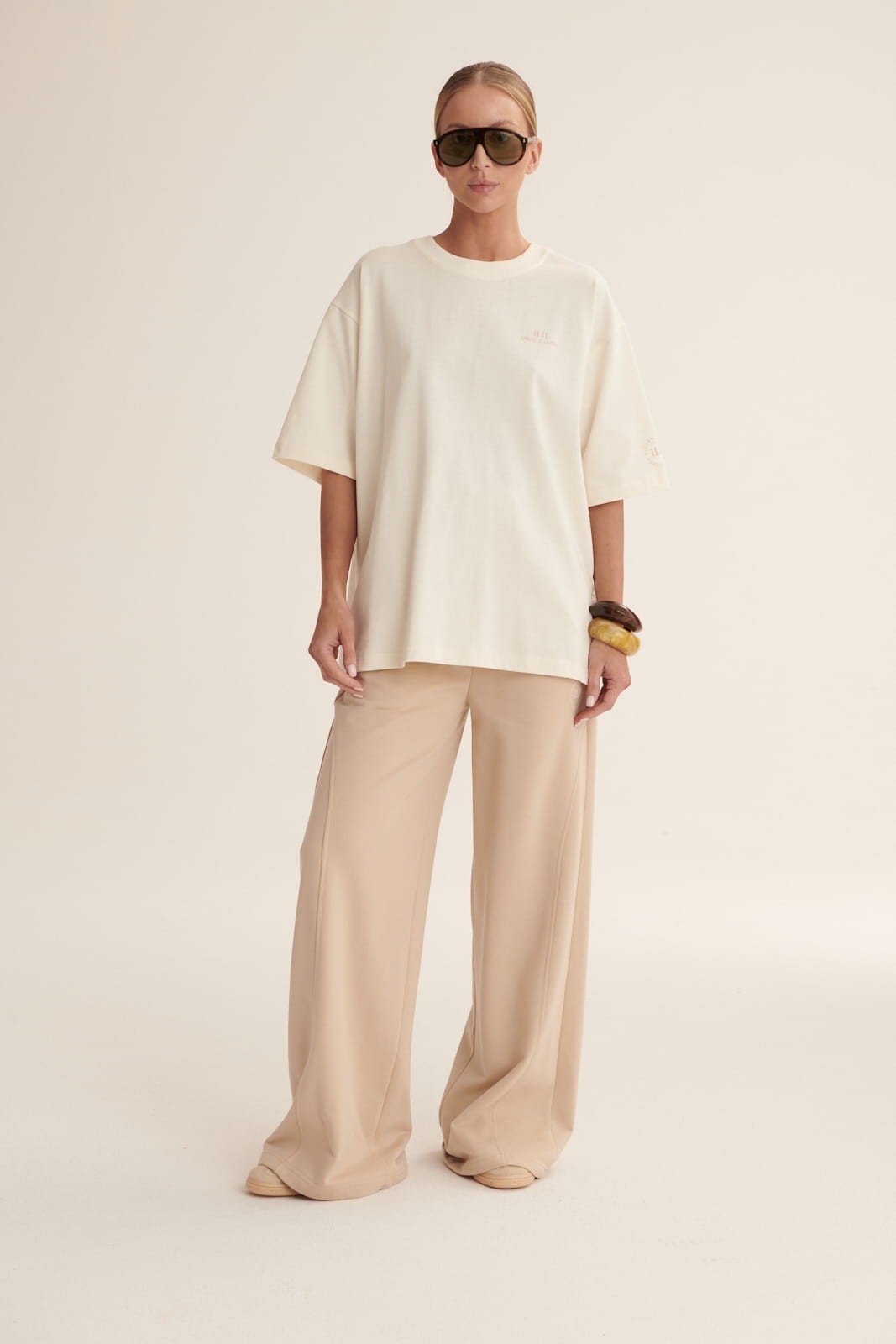 Beige T shirt Logo image 1