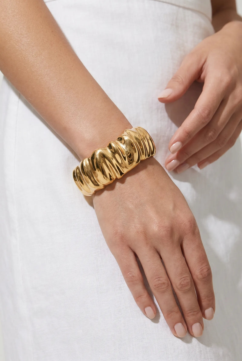 Wide band rigid bracelet