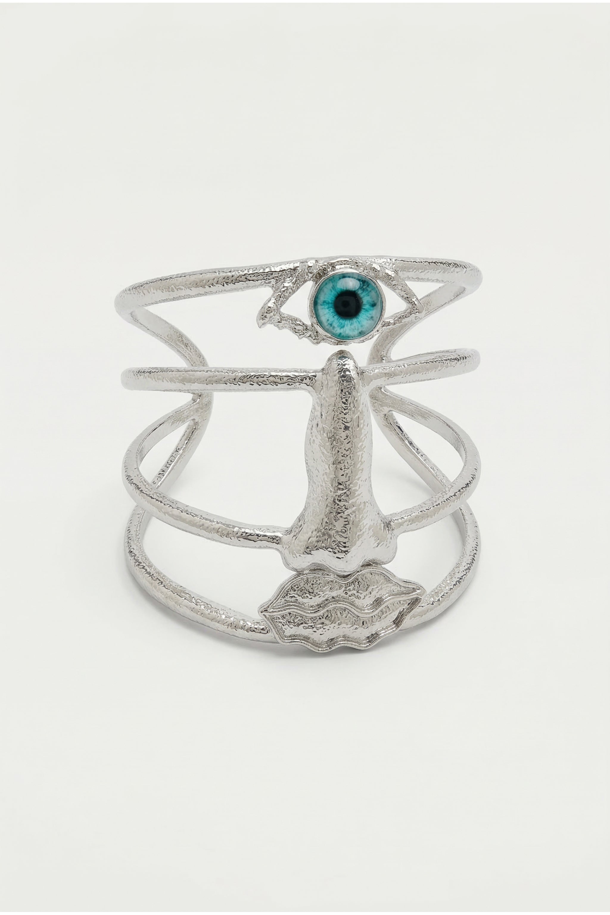 Sculptural face cuff bracelet in silver