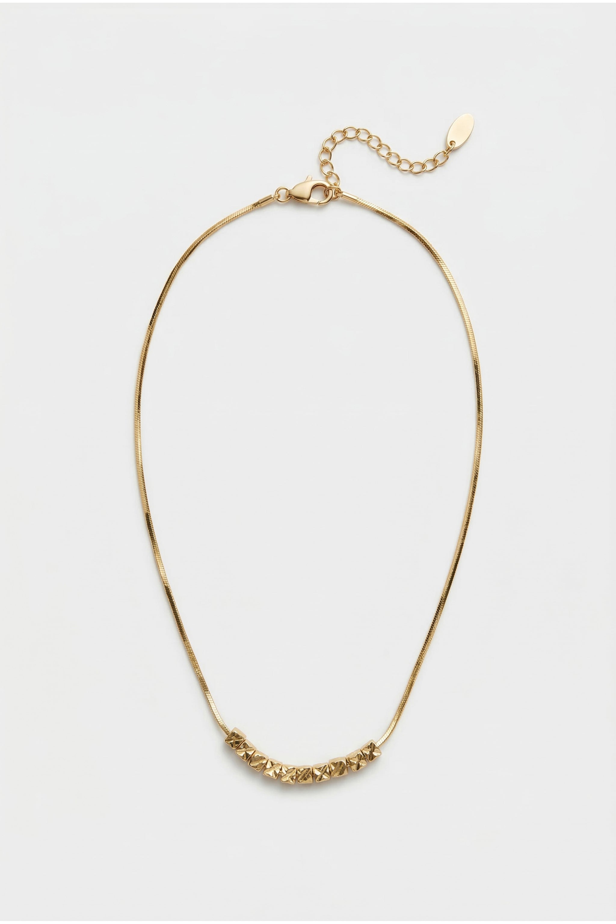 Geometric rhinestone necklace in gold image 1