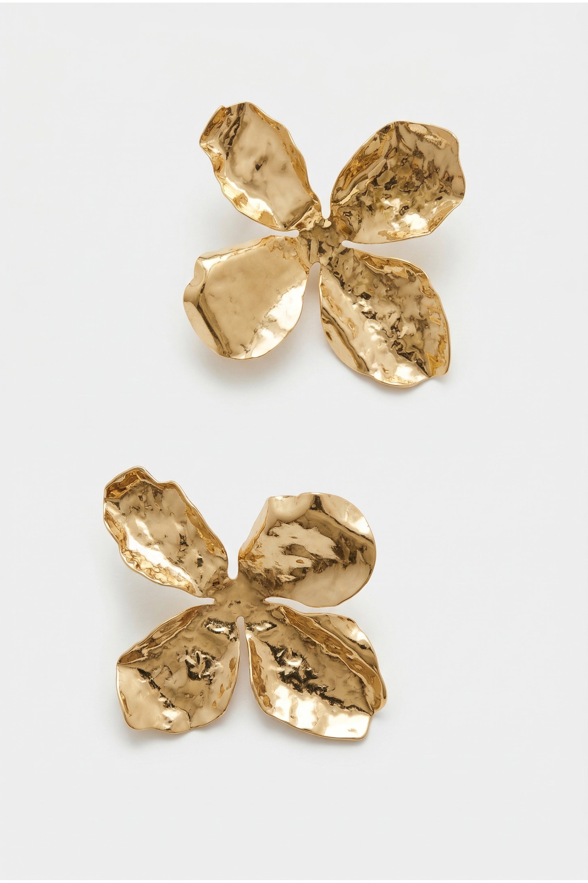 Floral statement earrings in gold