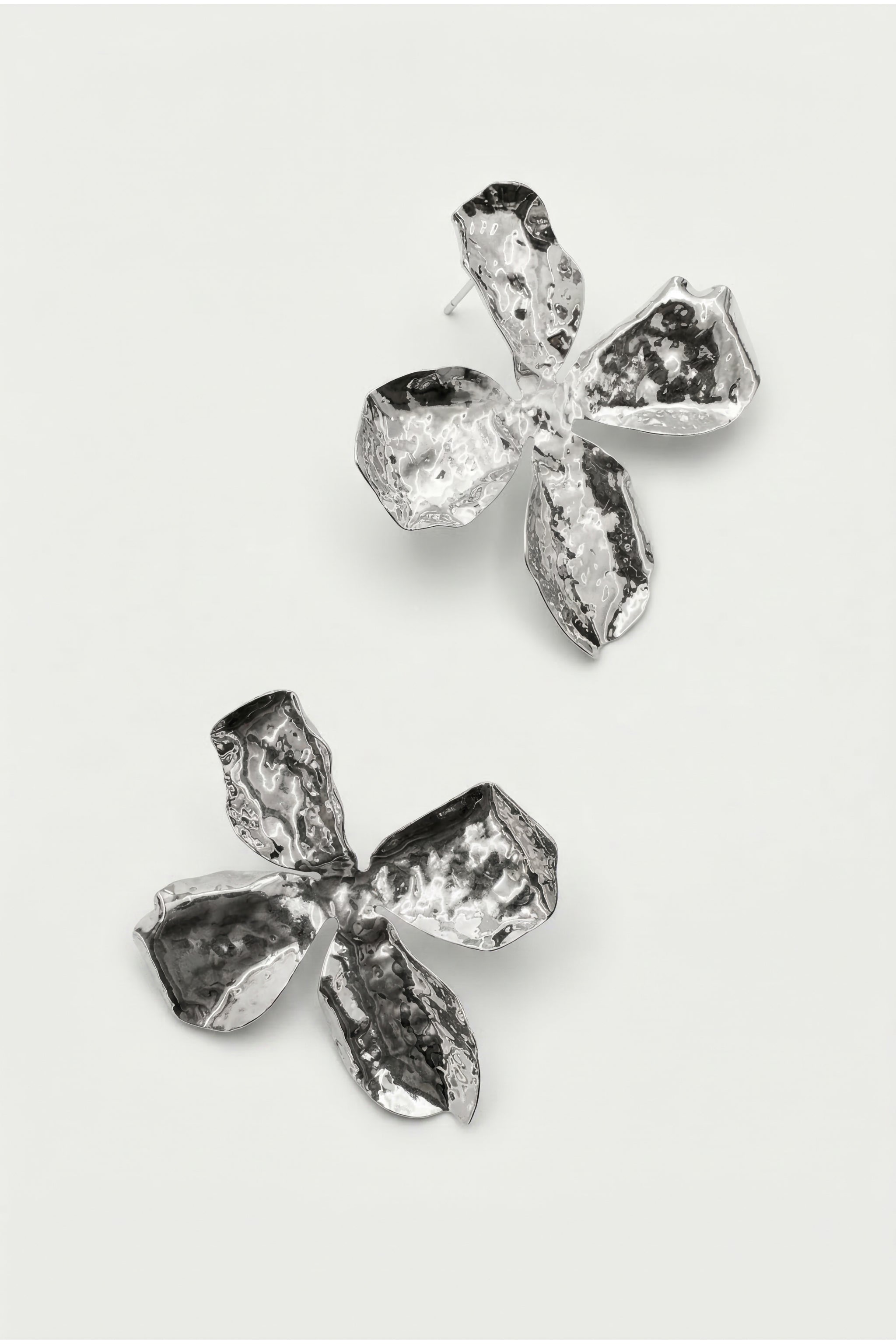 Floral statement earrings in silver