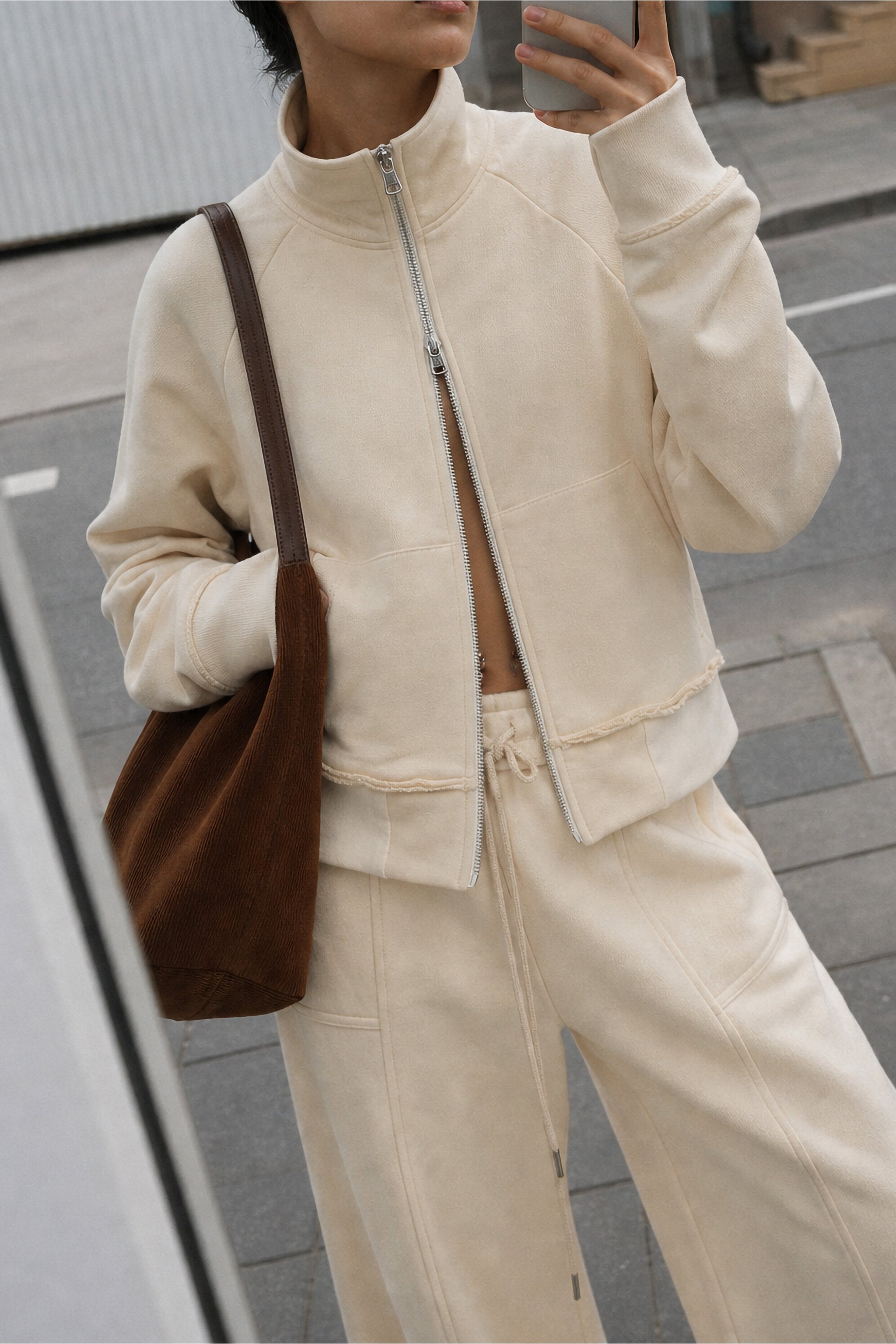Cropped cotton zip sweatshirt in pearl editorial image 1